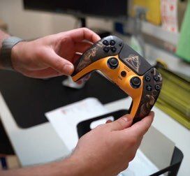 A custom controller on a streamer's desk